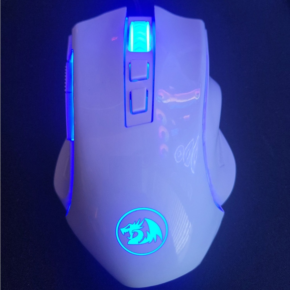 Hardly used all white red dragon mouse. Multi colors with 6ft cord